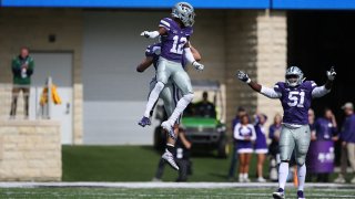 FILE: Kansas State Wildcats defensive back AJ Parker (12) leaps in celebration after a sack by defensive end Kyle Alan Ball (44) in the third quarter of a Big 12 football game between the Oklahoma State Cowboys and Kansas State Wildcats on Oct. 13, 2018 at Bill Snyder Family Stadium in Manhattan, Kansas.