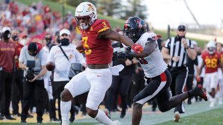 Running back Kene Nwangwu #3 of the Iowa State Cyclones is tackled by defensive back Eric Monroe #11 of the Texas Tech Red Raiders as he rushed for yards in the second half of the play at Jack Trice Stadium on Oct. 10, 2020 in Ames, Iowa. The Iowa State Cyclones won 31-15 over the Texas Tech Red Raiders.