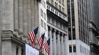 American flags hang outside the New York Stock Exchange, Oct. 26, 2020.