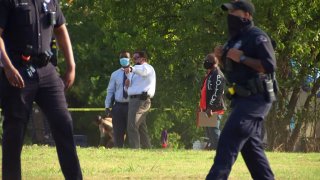 A male has died after he was found with gunshot wounds Friday afternoon in an open field, Dallas police say.