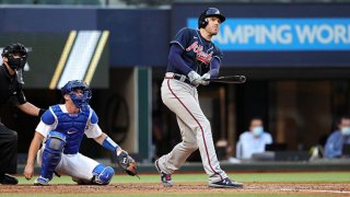 Freddie Freeman #5 of the Atlanta Braves hits a two-run home run in the fourth inning during Game 2 of the NLCS between the Atlanta Braves and the Los Angeles Dodgers at Globe Life Field on Tuesday, Oct. 13, 2020 in Arlington, Texas.