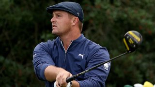 Bryson DeChambeau of the United States plays his shot from the 18th tee during the continuation of the second round of the Masters at Augusta National Golf Club on Nov. 14, 2020 in Augusta, Georgia.