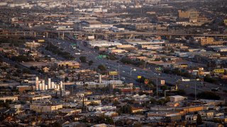 Vehicles travel along Interstate 10 highway in El Paso, Texas, U.S., on Monday, Nov. 9, 2020. In Texas's worst hotspot, El Paso, the outbreak is spreading faster than in Texas biggest city, Houston, which has almost six times the population. El Paso County recorded 705 new cases in the past 24 hours, dwarfing the Houston region's 451.