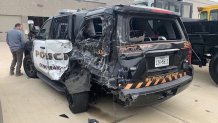 A photo shows the damage done to a Grand Prairie Police Department SUV after an inattenttive driver slammed into the cruiser causing a chain reaction crash caught on camera.