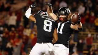 Tight end Chase Allen #11 of the Iowa State Cyclones celebrates with teammate wide receiver Xavier Hutchinson #8 after scoring a touchdown in the second half of the play at Jack Trice Stadium on November 7, 2020 in Ames, Iowa. The Iowa State Cyclones won 38-31.