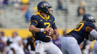 West Virginia Mountaineers quarterback Jarret Doege (2) looks to pass during the third quarter of the college football game between the TCU Horned Frogs and the West Virginia Mountaineers on Nov. 14, 2020, at Mountaineer Field at Milan Puskar Stadium in Morgantown, West Virginia.