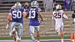 Safety Jason Taylor II #25 of the Oklahoma State Cowboys returns a fumble 85-yards for a touchdown against the Kansas State Wildcats during the fourth quarter at Bill Snyder Family Football Stadium on Nov. 7, 2020 in Manhattan, Kansas.