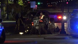 About 9:45 p.m., a SUV ran the light at East Rosedale Street and Evans Avenue and clipped a truck that was about to turn left. The impact flipped the SUV, which struck two pedestrians who were crossing the street, police said.