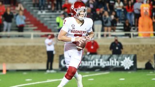 FILE - Quarterback Spencer Rattler #7 of the Oklahoma Sooners looks to pass during the first half of the college football game against the Texas Tech Red Raiders at Jones AT&T Stadium on Oct. 31, 2020 in Lubbock, Texas.