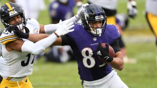 Baltimore Ravens tight end Mark Andrews (89) runs by Pittsburgh Steelers free safety Minkah Fitzpatrick (39) in the fourth quarter at M&T Bank Stadium.