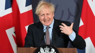 In this Dec. 24, 2020, file photo, Britain's Prime Minister Boris Johnson holds a remote press conference to update the nation on the post-Brexit trade agreement, inside 10 Downing Street in central London.