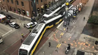 A northbound Orange Line train "made contact" with a southbound Red Line train at the St. Paul Station around 1:15 p.m., Dallas Area Rapid Transit spokesman Gordon Shattles said.