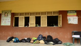 Backpacks outside a classroom in Lagos, Nigeria