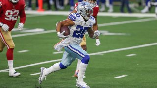 Dallas Cowboys Running Back Tony Pollard (20) runs to the end zone for a touchdown during the game between the Dallas Cowboys and San Francisco 49ers on Dec. 20, 2020 at AT&T Stadium in Arlington, Texas.