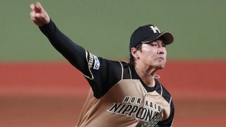 Nippon Ham starter Kohei Arihara pitches the ball during the Japanese professional baseball game between Seibu and Nippon Ham at the Metlife Dome in Tokorozawa, Saitama prefecture on June 19, 2020. Japan's professional baseball season began behind closed doors on June 19, three months after the originally scheduled start as the country gradually rolls back its anti-coronavirus measures.