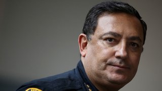 Houston police chief Art Acevedo looks on during a press conference following a tour of the NRG Center evacuation center on September 4, 2017 in Houston, Texas. Over a week after Hurricane Harvey hit Southern Texas, residents are beginning the long process of recovering from the storm.