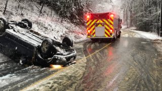 A car that crashed amid a nor'easter in Oakham, Massachusetts, on Saturday, Dec. 5, 2020.