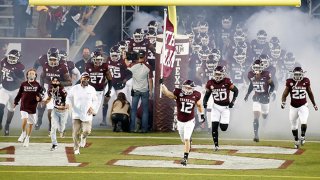 The Texas A&M Aggies take the field before the game against the Arkansas Razorbacks at Kyle Field on Oct. 31, 2020 in College Station, Texas.