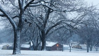 Snow covered Flag Pole Hill Park in a layer of white during Christmas in Dallas in 2012.