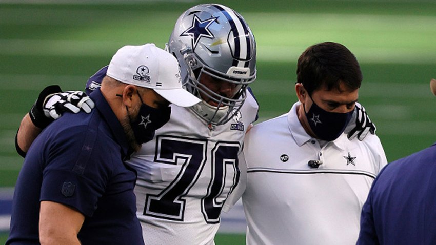Zack Martin #70 of the Dallas Cowboys heads off the field during the first quarter of a game against the Washington Football Team at AT&T Stadium on Nov. 26, 2020 in Arlington, Texas.