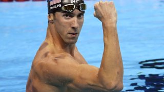 Michael Phelps celebrates after he won the Men’s 200m Butterfly Final during the swimming event at the Rio 2016 Olympic Games.