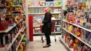 A shopper wearing a face mask due to the coronavirus disease (COVID-19) pandemic browses toys at a Target store in King of Prussia, Pennsylvania, November 20, 2020.