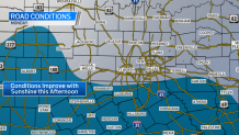 After heavy snow Sunday in the dark-blue area, road conditions are expected to improve Monday, Jan. 11, 2021.