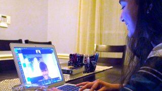 Charvi Goyal, 17, gives an online math tutoring session