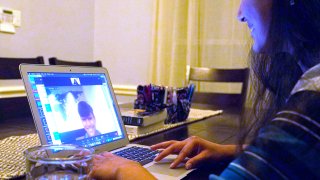 Charvi Goyal, 17, gives an online math tutoring session