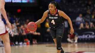 Texas Tech Red Raiders Guard Chrislyn Carr (04) dribbles during the BIG12 Women's basketball tournament between the Oklahoma Sooners and the Texas Tech Red Raiders on March 8, 2019, at the Chesapeake Energy Arena in Oklahoma City, Oklahoma.