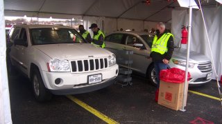 Instead of a line of cars waiting to attend a football game, hundreds showed up to Homer B Johnson Stadium on Centerville Rd. in Garland on Thursday to receive their COVID-19 vaccine.