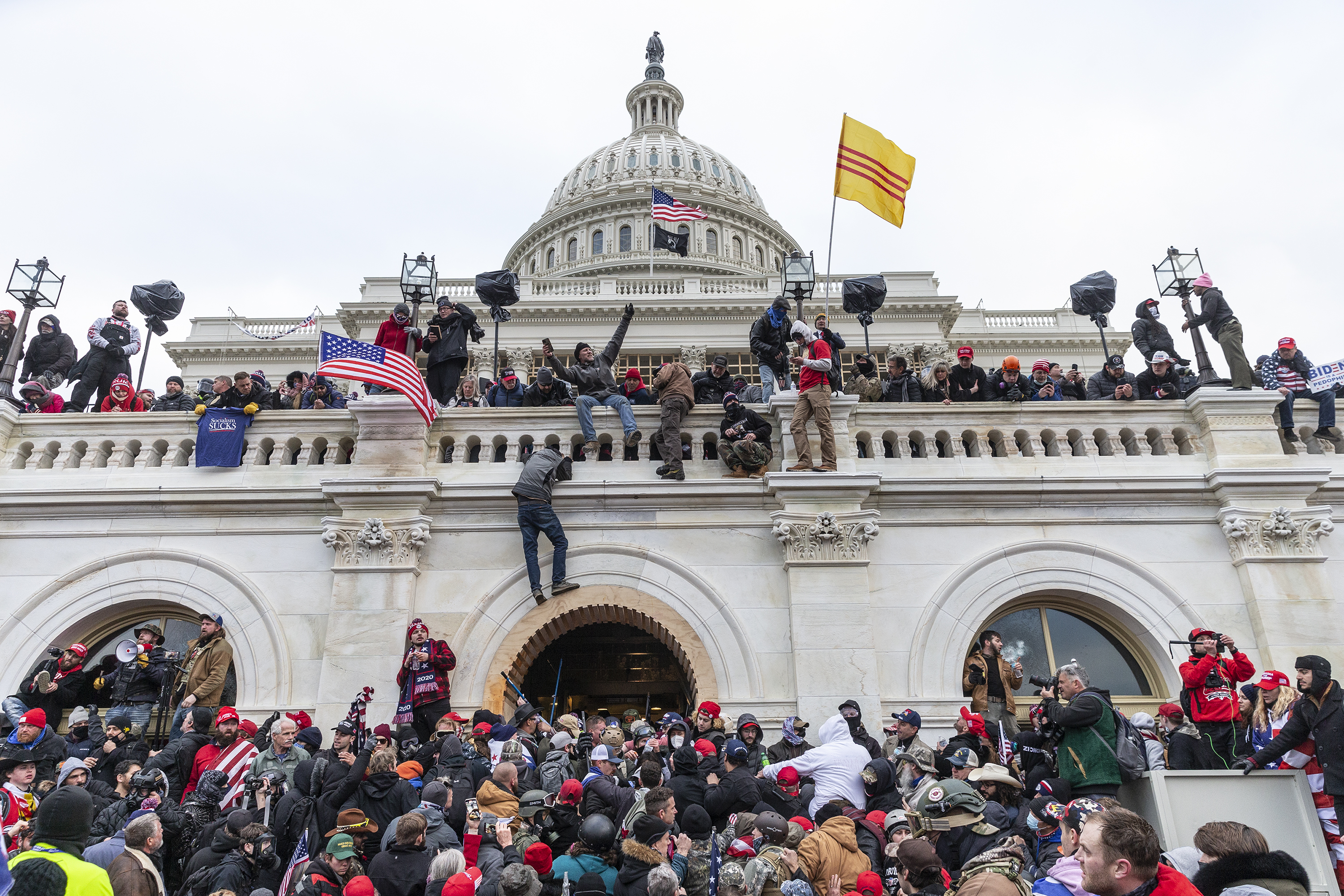 In this Jan. 6, 2021, file photo, protesters seen all over Capitol building where pro-Trump supporters riot and breached the Capitol. Rioters broke windows and breached the Capitol building in an attempt to overthrow the results of the 2020 election.
