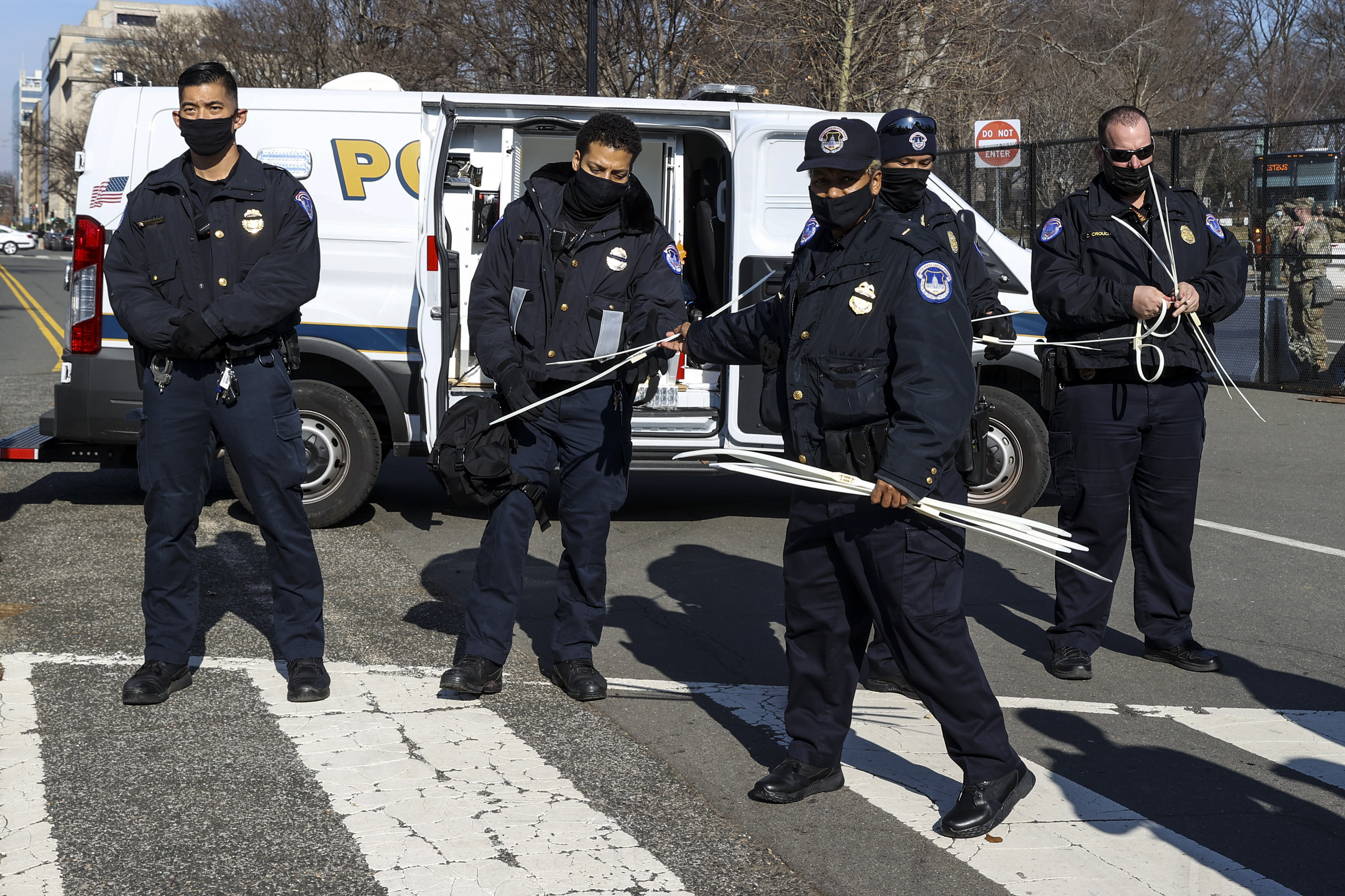 WASHINGTON, DC &#8211; JANUARY 13: U.S. Capitol Police prepare to make arrests as anti-Trump protesters gather on the West Front of the U.S. Capitol on January 13, 2021 in Washington, DC. The House of Representatives is expected to vote to impeach President Donald Trump later today, after Vice President Mike Pence declined to use the 25th amendment to remove him from office following a violent breach of the U.S. Capitol by a pro-Trump mob last week. (Photo by Tasos Katopodis/Getty Images)