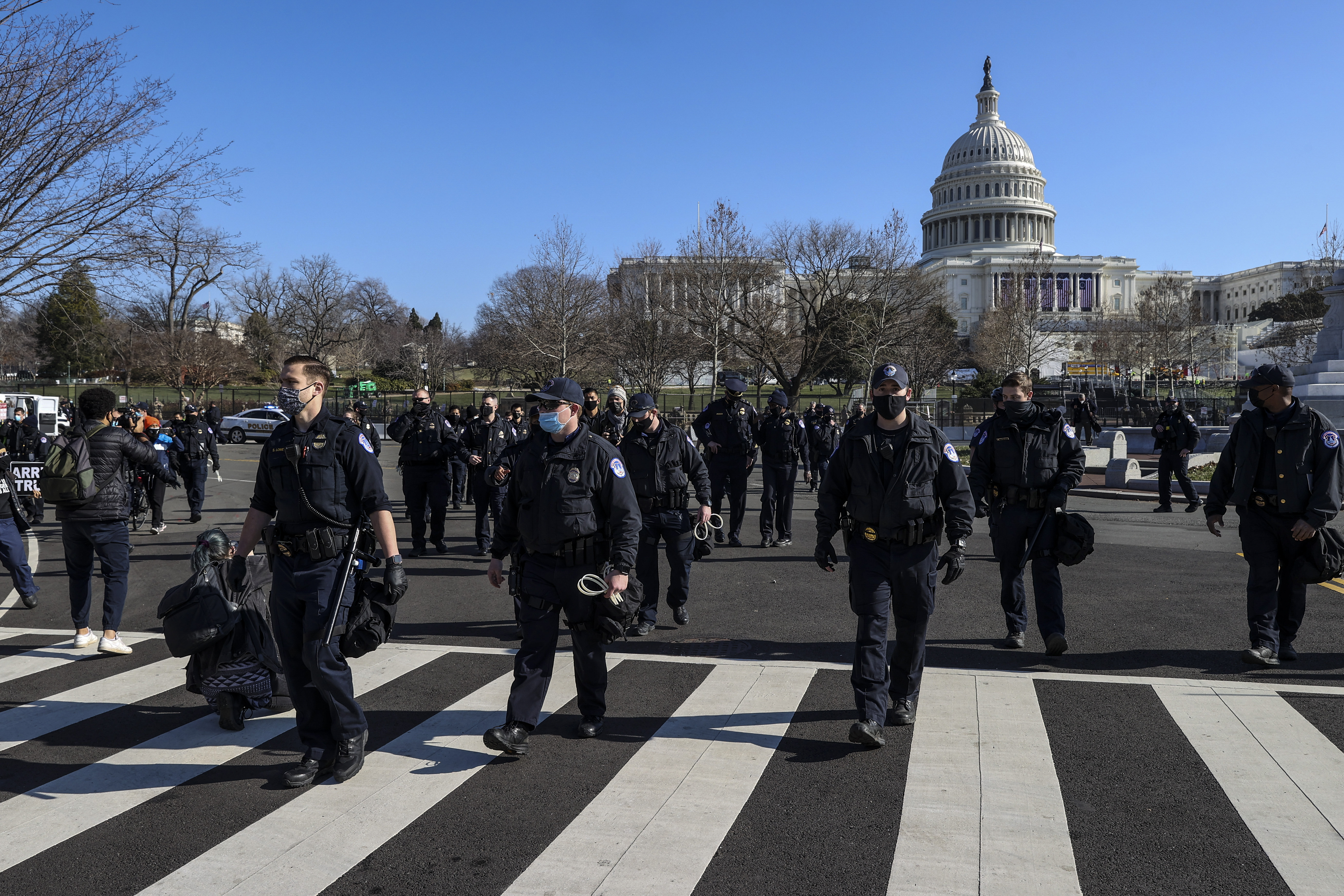 WASHINGTON, DC &#8211; JANUARY 13: U.S. Capitol Police prepare to make arrests as anti-Trump protesters gather on the West Front of the U.S. Capitol on January 13, 2021 in Washington, DC. The House of Representatives is expected to vote to impeach President Donald Trump later today, after Vice President Mike Pence declined to use the 25th amendment to remove him from office following a violent breach of the U.S. Capitol by a pro-Trump mob last week. (Photo by Tasos Katopodis/Getty Images)