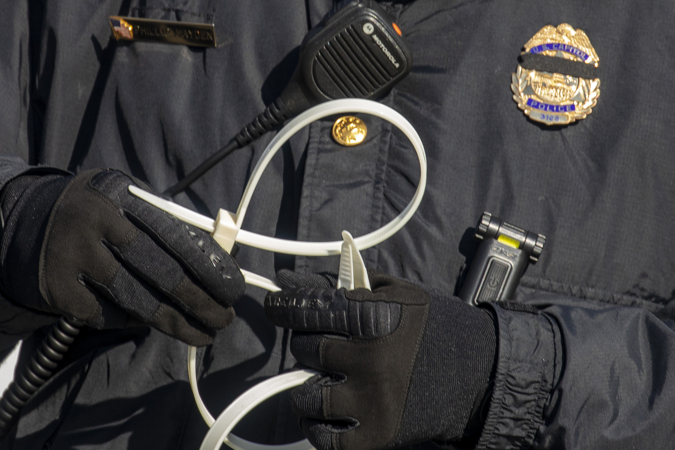 WASHINGTON, DC &#8211; JANUARY 13: U.S. Capitol Police prepare to make arrests as anti-Trump protesters gather on the West Front of the U.S. Capitol on January 13, 2021 in Washington, DC. The House of Representatives is expected to vote to impeach President Donald Trump later today, after Vice President Mike Pence declined to use the 25th amendment to remove him from office following a violent breach of the U.S. Capitol by a pro-Trump mob last week. (Photo by Tasos Katopodis/Getty Images)