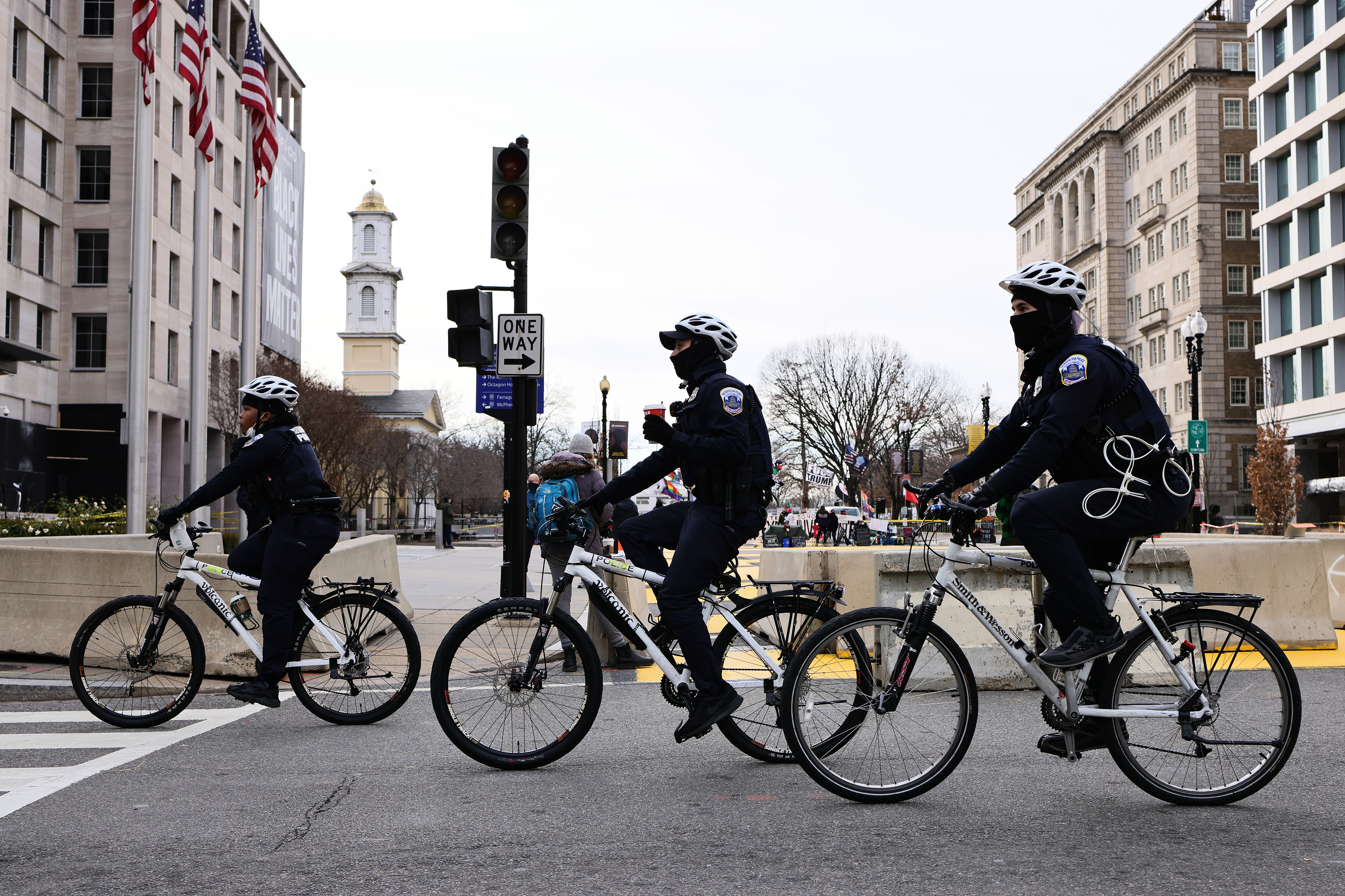 WASHINGTON, DC &#8211; JANUARY 17: DC Police on bikes ride past Black Lives Matter plaza on January 17, 2021 in Washington, DC. After last week&#8217;s riots at the U.S. Capitol Building, the FBI has warned of additional threats in the nation&#8217;s capital and in all 50 states. According to reports, as many as 25,000 National Guard soldiers will be guarding the city as preparations are made for the inauguration of Joe Biden as the 46th U.S. President.  (Photo by Michael M. Santiago/Getty Images)