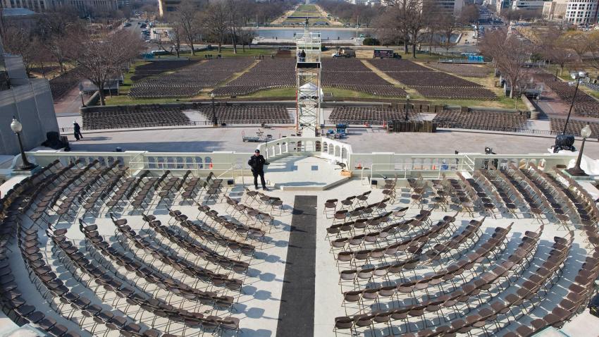 A US Capitol Police Officer keeps an eye on the VIP podium where Barack Obama will be sworn in as the 44th US President