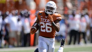 Texas Longhorn RB Keaontay Ingram runs for yardage during game featuring the TCU Horned Frogs and the Texas Longhorns on Oct. 3, 2020, at Darrell K Royal-Texas Memorial Stadium in Austin, Texas.