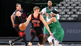 Lauri Markkanen #24 of the Chicago Bulls handles the ball during the game against the Dallas Mavericks on Jan. 17, 2021 at the American Airlines Center in Dallas, Texas.