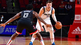 Luka Doncic #77 of the Dallas Mavericks handles the ball against James Harden #13 of the Houston Rockets during the game on Jan. 4, 2021 at the Toyota Center in Houston, Texas.
