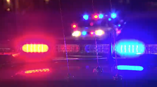 Police lights against a dark sky