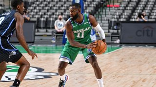 Tim Hardaway Jr. #11 of the Dallas Mavericks looks to pass the ball during the game against the Orlando Magic on Jan. 9, 2021 at the American Airlines Center in Dallas, Texas.