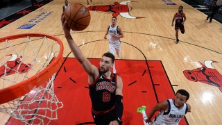Zach LaVine #8 of the Chicago Bulls dunks the ball on Jan. 3, 2021 at the United Center in Chicago, Illinois.