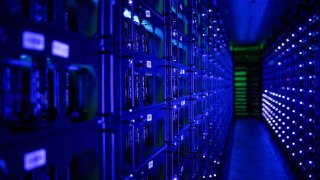 Cryptocurrency mining rigs at a crypto mining farm in Romania.