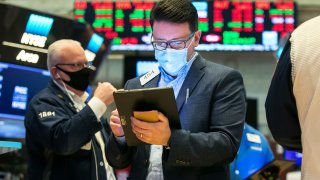 Traders on the floor of the New York Stock Exchange.