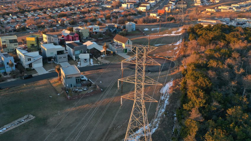 An aerial view from a drone shows electrical lines running through a neighborhood on February 19, 2021 in Austin, Texas