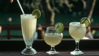 Three types of margaritas--frozen, straight up, and on the rocks.
