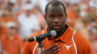 Quarterback Vince Young of the Tennessee Titans speaks after his Texas Longhorns jersey number is retired before a game against the Florida Atlantic Owls at Darrell K Royal-Texas Memorial Stadium on August 30, 2007 in Austin, Texas.