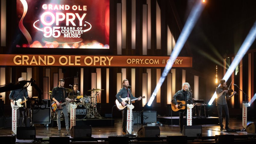 In this image released on February 14th, Dierks Bentley and Marty Stuart perform during the "Grand Ole Opry: 95 Years of Country Music" special at the Grand Ole Opry in Nashville, Tennessee.