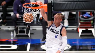 Kristaps Porzingis #6 of the Dallas Mavericks dunks during the first half against the Brooklyn Nets at Barclays Center on Feb. 27, 2021 in the Brooklyn borough of New York City.